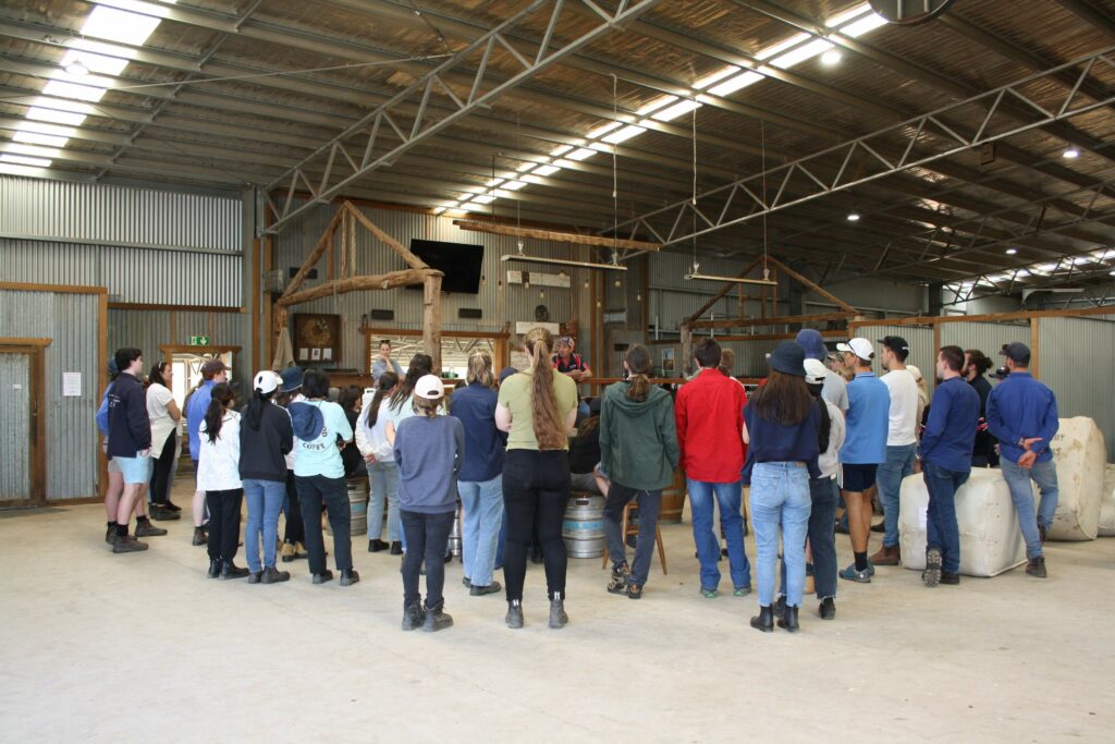 Alex and Fiona McGorman, of the Thornby Lamb Feedlot give an overview of operations to students.